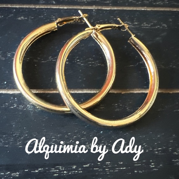Gold-Toned Hoop Earrings with Hinged Closure and Polished Finish - Picture 1 of 1